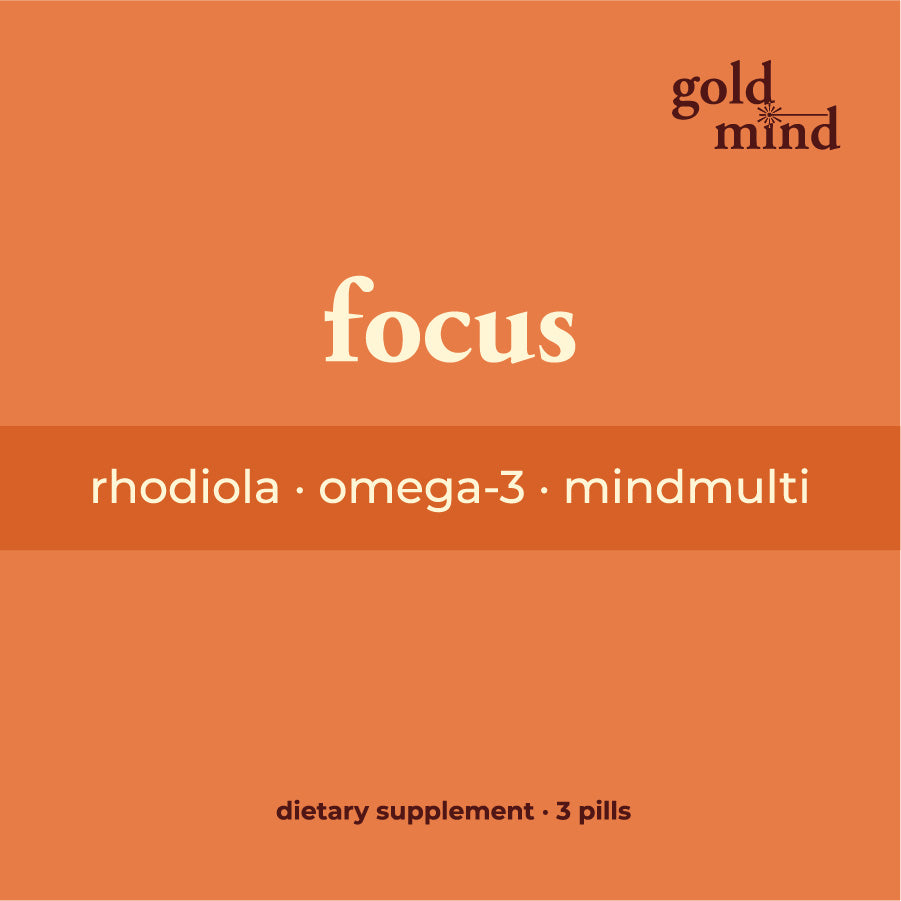 Dietary supplement packaging with 'goldmind' brand on an orange background