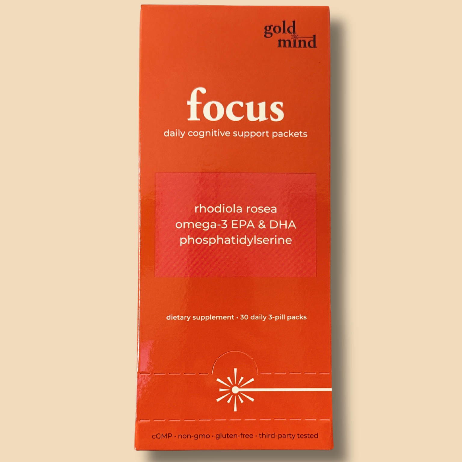 Box of Goldmind:Focus daily cognitive support packets on a beige background